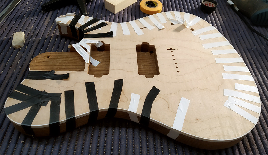 Build your own guitar onine gluing the binding 