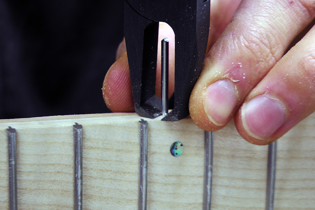Build your own guitar online inserting the side dots