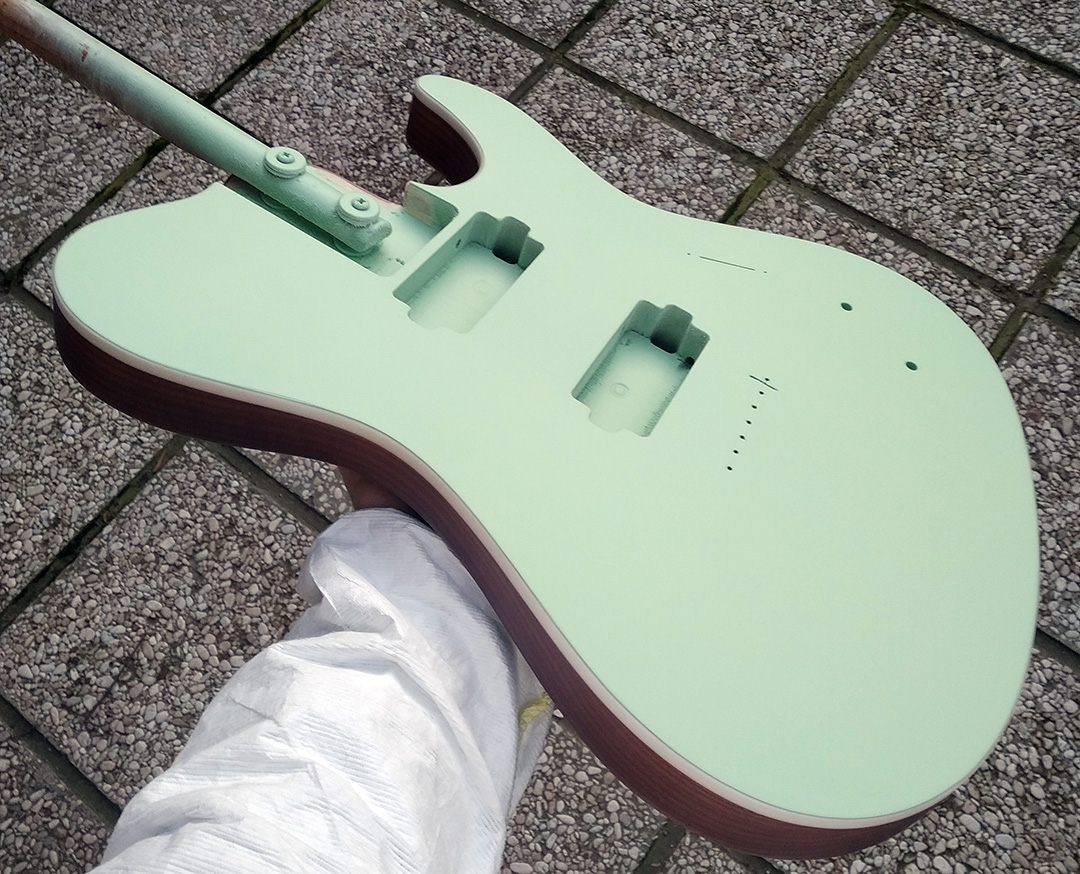 Build your own guitar online spraying the guitar top