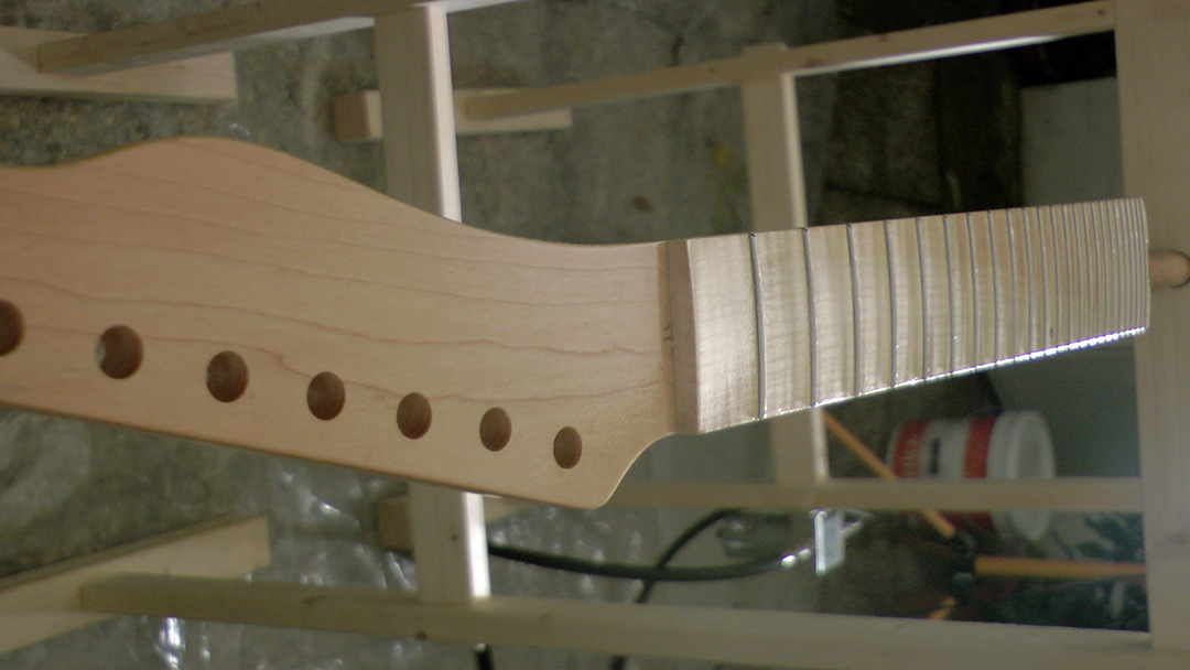 Build your own guitar online spraying the neck